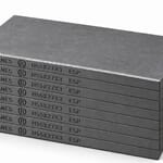 HARDVANES® H55273/8 — Kit de 8 paletas 55 × 27 × 3 mm de carbono-grafito con bisel y grabado H55X27X3 ESP a la izquierda