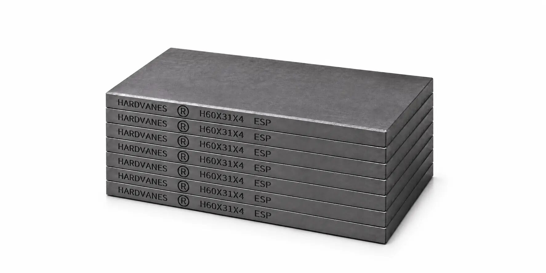 Kit HARDVANES® de 7 paletas idénticas de 60 × 31 × 4 mm, apiladas y alineadas sobre fondo blanco.